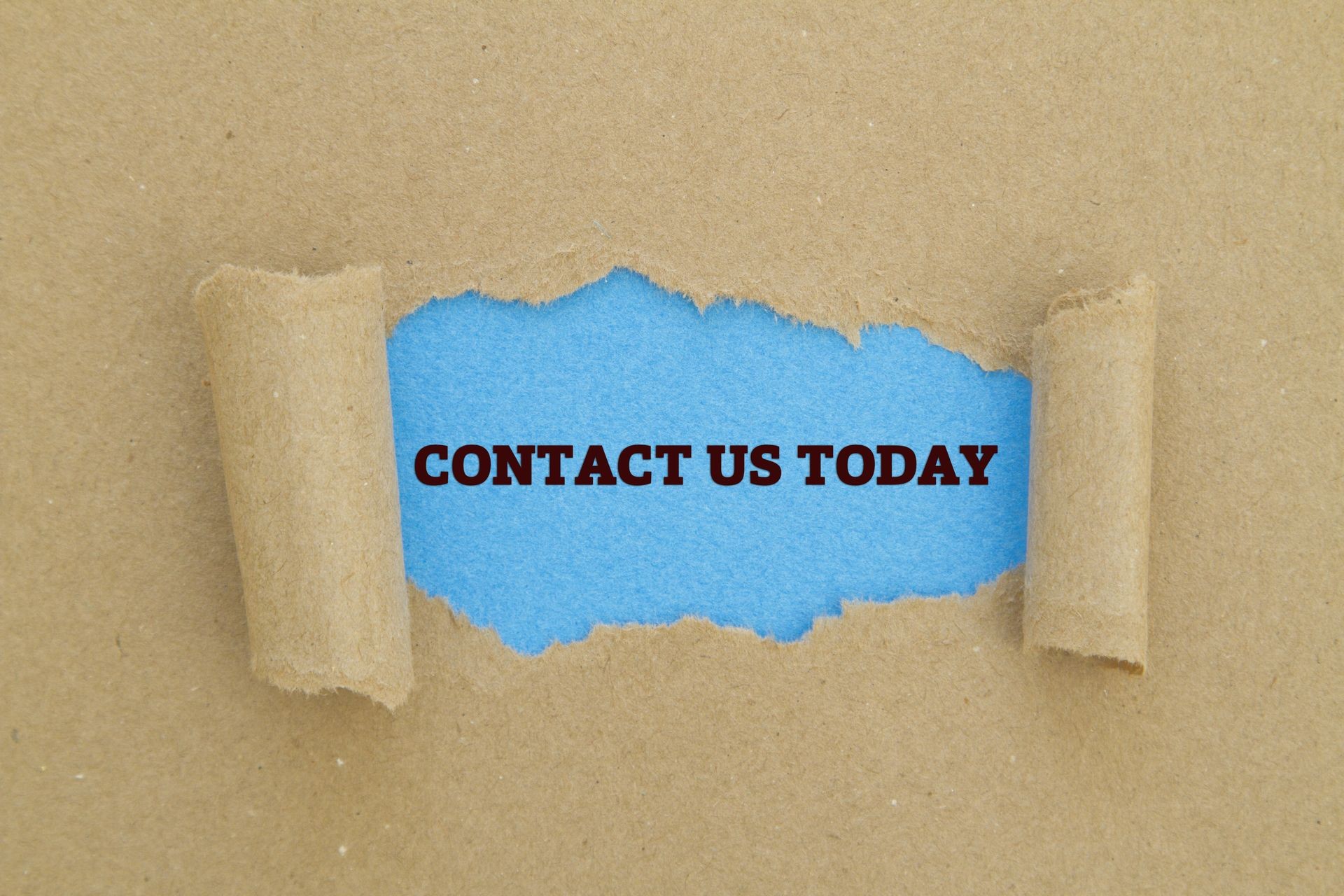 CONTACT US TODAY written under torn paper.